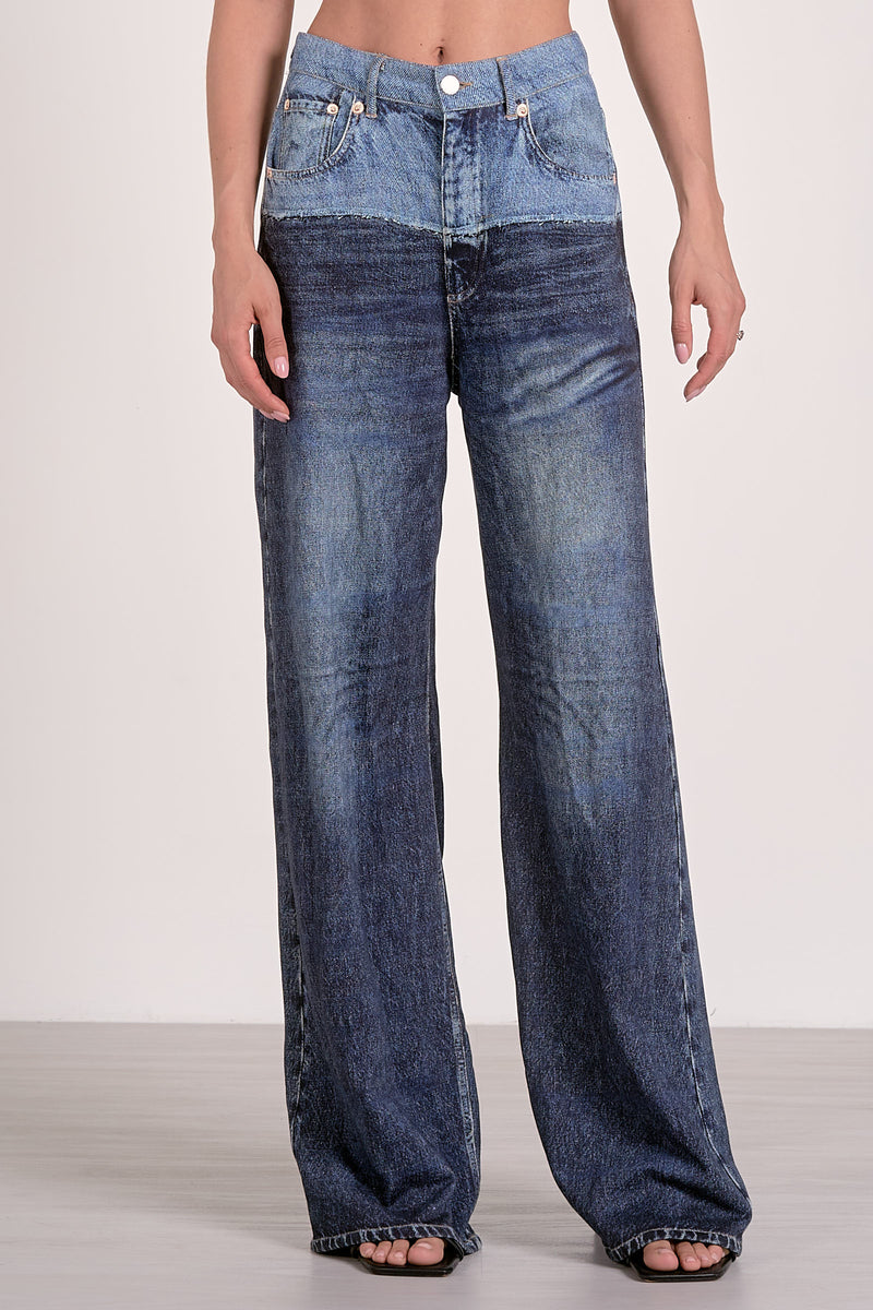 Two-tone wide-leg jeans in a light to dark denim gradient, offering a relaxed fit, perfect for stylish Long Island boutique fashion.